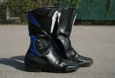 Pair of black and blue motorcycle touring boots