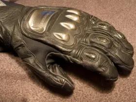 Close-up of a leather motorcycle glove with knuckle protection