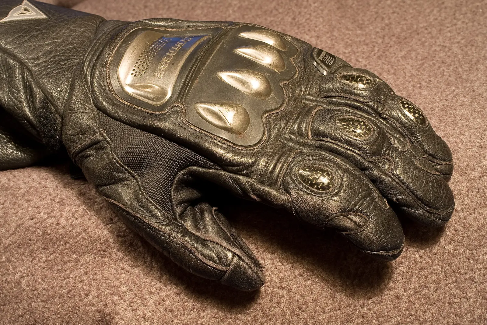 Close-up of a leather motorcycle glove with knuckle protection