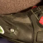 Close-up of the toe slider on a motorcycle boot