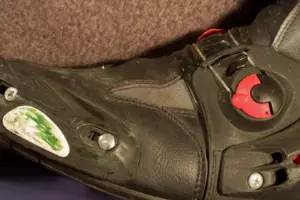 Close-up of the toe slider on a motorcycle boot