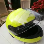 Full-face motorcycle helmet showing its raised visor