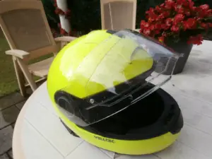Full-face motorcycle helmet showing its raised visor