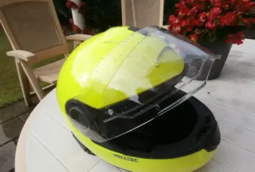 Full-face motorcycle helmet showing its raised visor