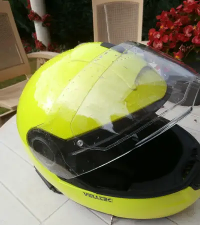 Full-face motorcycle helmet showing its raised visor