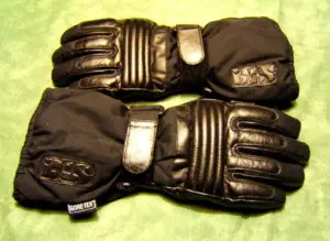 Pair of black insulated motorcycle gloves