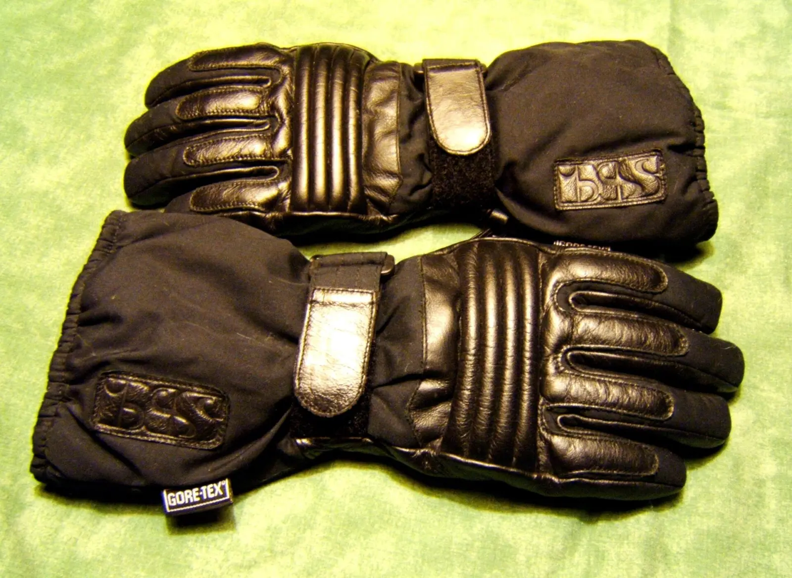 Pair of black insulated motorcycle gloves