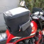 Tank bag fitted to a motorcycle fuel tank