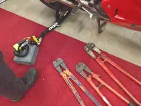 Motorcycle security locks and chains displayed together