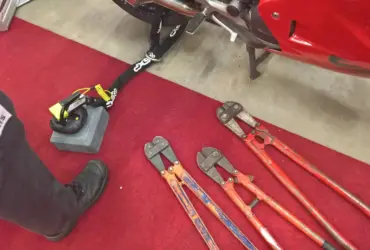 Motorcycle security locks and chains displayed together
