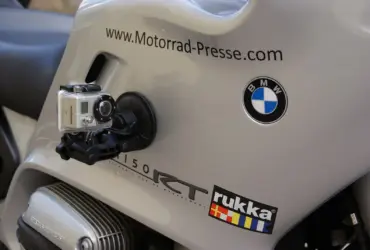 Action camera mounted to the bodywork of a touring motorcycle