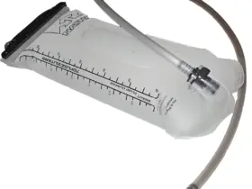 Hydration reservoir with drinking tube laid out for inspection