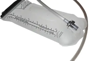 Hydration reservoir with drinking tube laid out for inspection