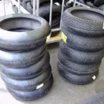 New motorcycle racing tyres arranged in stacks