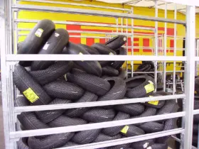 Motorcycle tyres displayed on storage racks