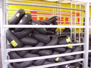 Motorcycle tyres displayed on storage racks