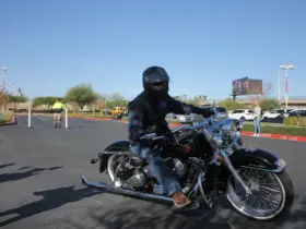 Cruiser rider wearing an open helmet and protective eyewear