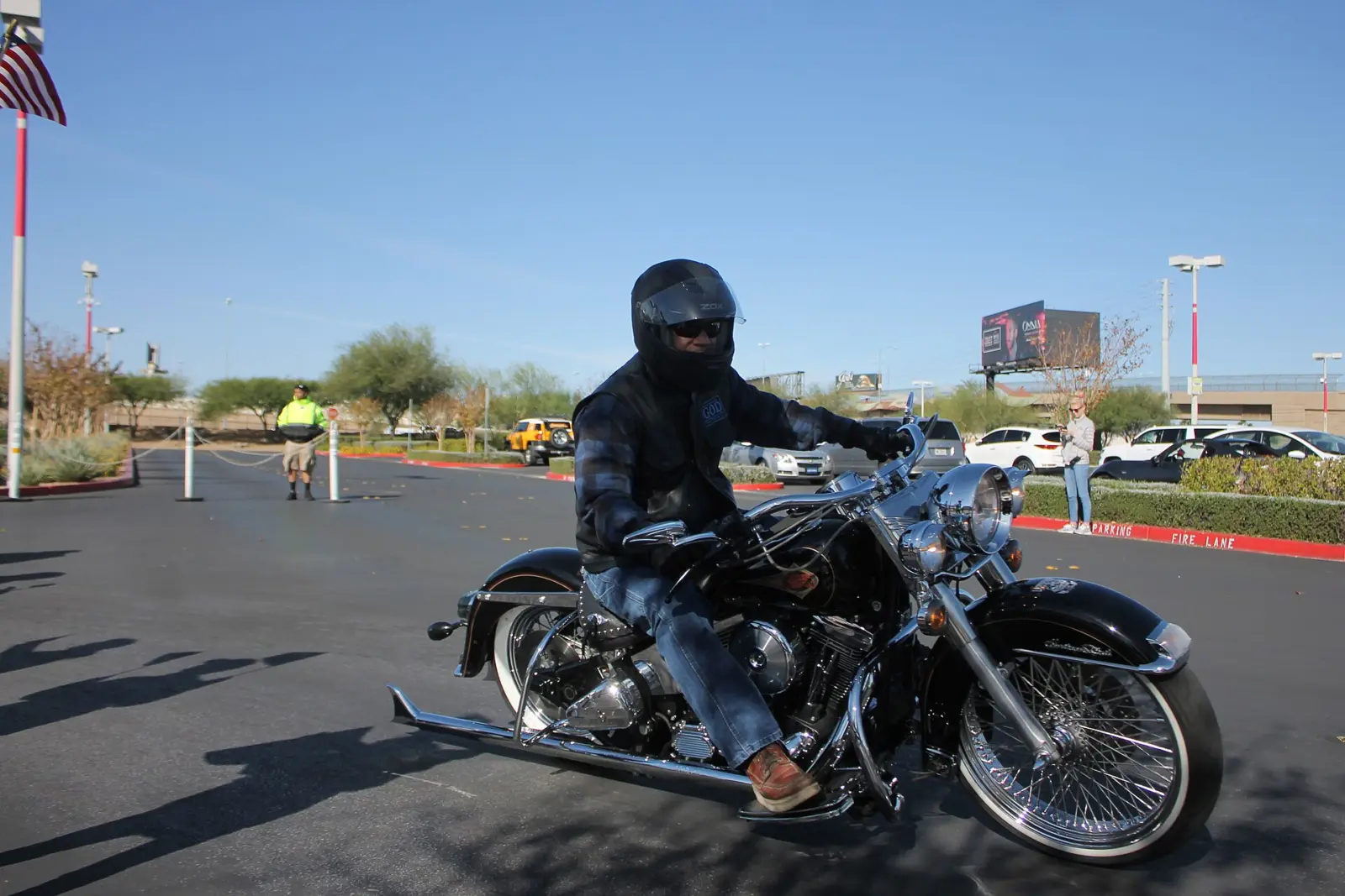 Cruiser rider wearing an open helmet and protective eyewear